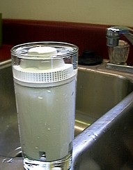 Filter soaking in glass of water